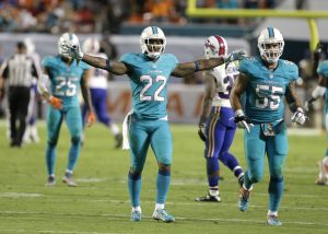 El cornerback de Miami Jamar Taylor (22) reacciona tras contener la ofensiva de los Bills. Foto: AP