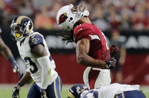 Larry Fitzgerald y los Cardenales buscan completar la barrida sobre los Rams  en la semana 15 de la NFL. Foto: AP