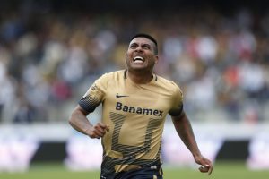 Pumas' Daniel Luduena celebrates after scoring against and Queretaro during a Mexican soccer league match in Mexico City, Sunday, Nov. 8, 2015. Pumas won 2-1.  (AP Photo/Moises Castillo)