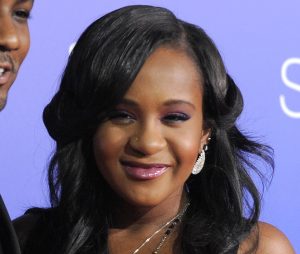 ARCHIVO - Foto de archivo, 16 de agosto de 2012, de Bobbi Kristina Brown en Los Angeles. Un forense informó el viernes 4 de marzo de 2016 que las causas probables de  muerte de la hija de Whitney Houston fueron inmersión en el agua e intoxicación con drogas.  (Photo by Jordan Strauss/Invision/AP, File)